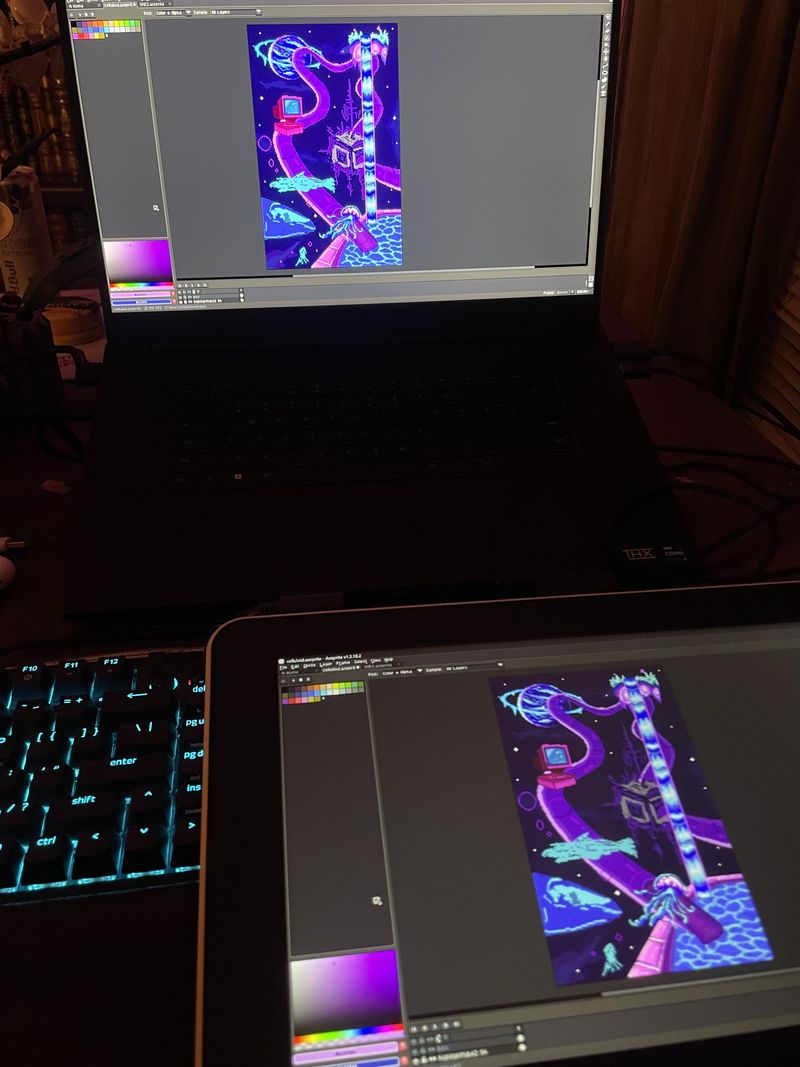 Kayla Fagan's piece in progress on her laptop and drawing tablet